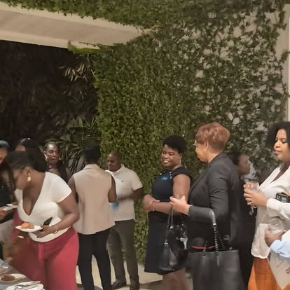 CIWiL AB members networking at an outdoor evening event.