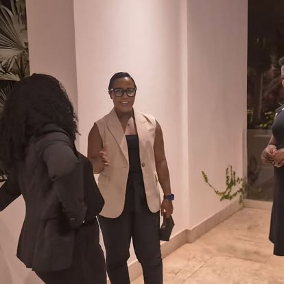 CIWiL AB member warmly greeting guests at an event.