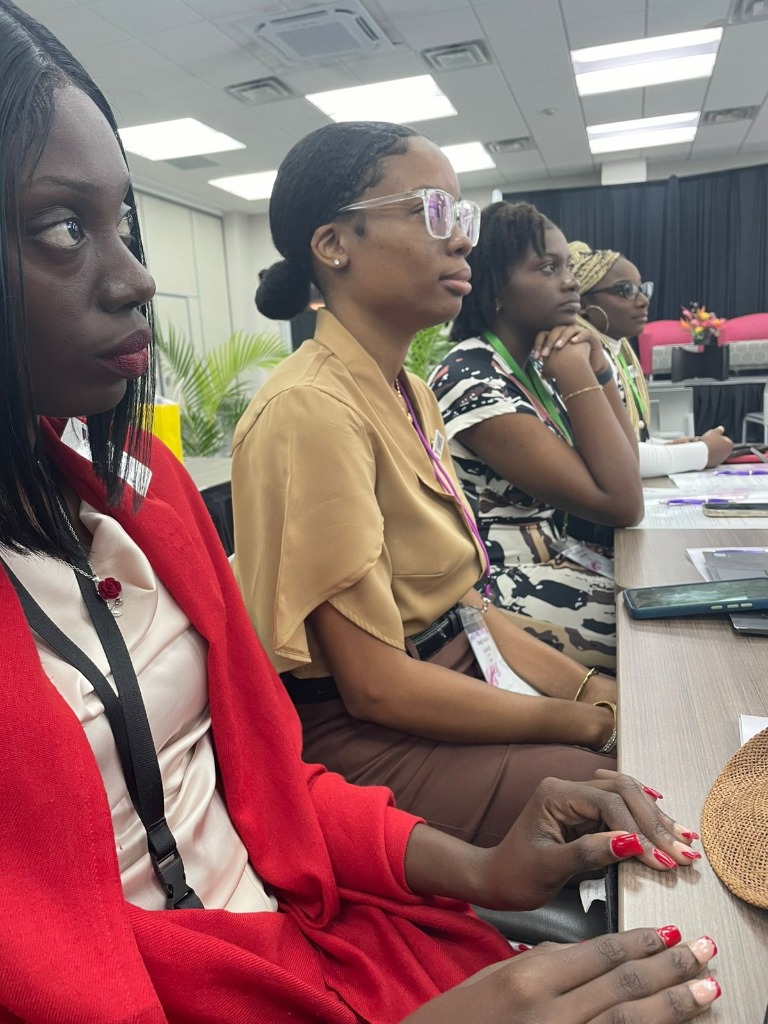 YWiL AB members listening attentively at a workshop training session